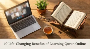 Benefits of learning Quran online illustrated with a study desk setup featuring Quran, tasbih, and laptop video call
