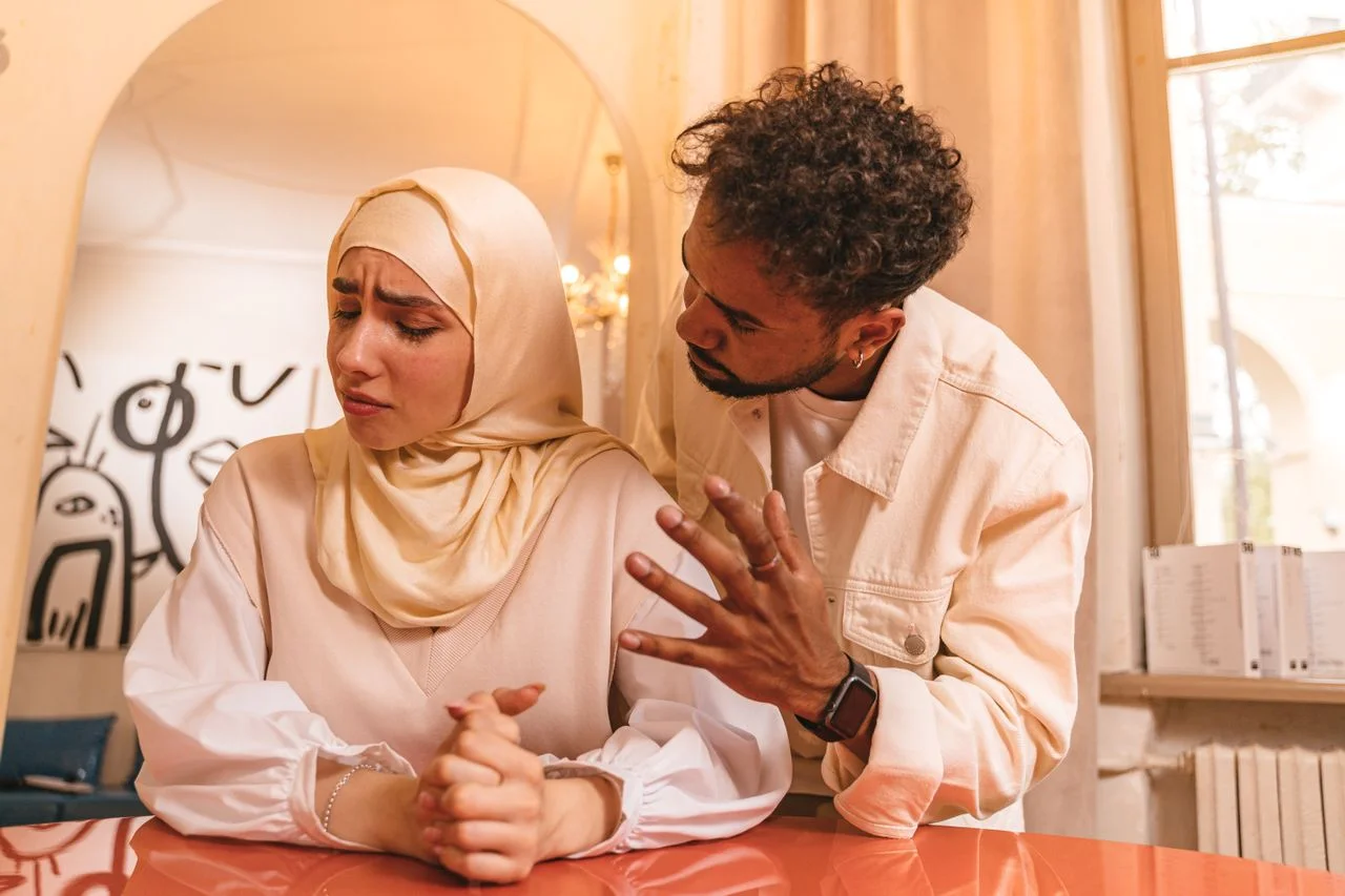 Person practicing patience and calm as a technique for controlling anger in Islam